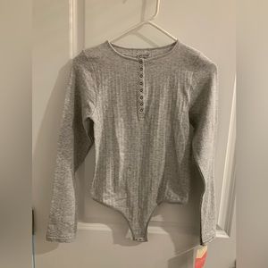 Yummie bodysuit size lg/x lg, brand new never wore, tag still on.